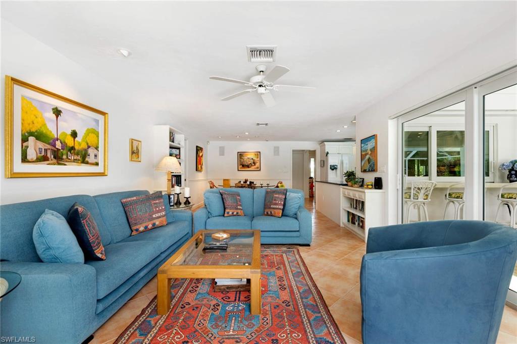 2989 Regatta Road Naples, FL 34103 - Photo 12 of 20 a living room with furniture and a rug