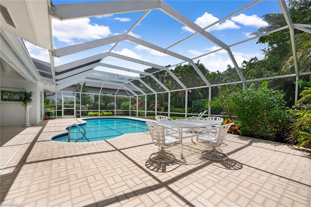 2989 Regatta Road Naples, FL 34103 - Photo 3 of 20 a view of a backyard with sitting area