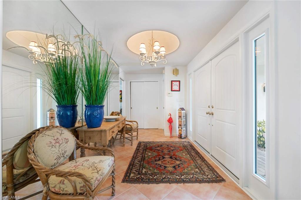 2989 Regatta Road Naples, FL 34103 - Photo 4 of 20 a living room with furniture