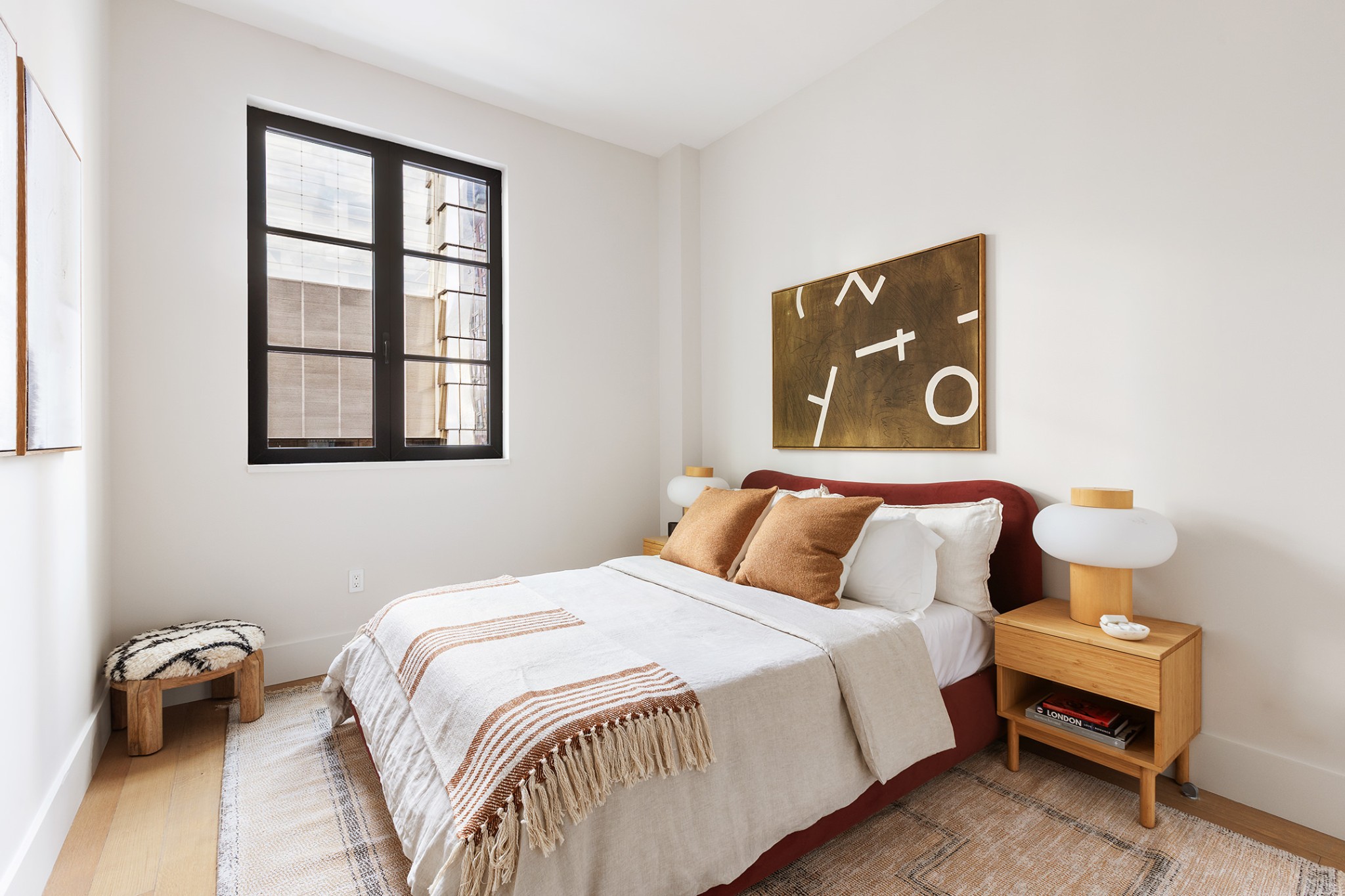 517 West 29th Street, Unit 8H Manhattan, NY 10001 - Photo 3 of 16 a bedroom with a bed and a window