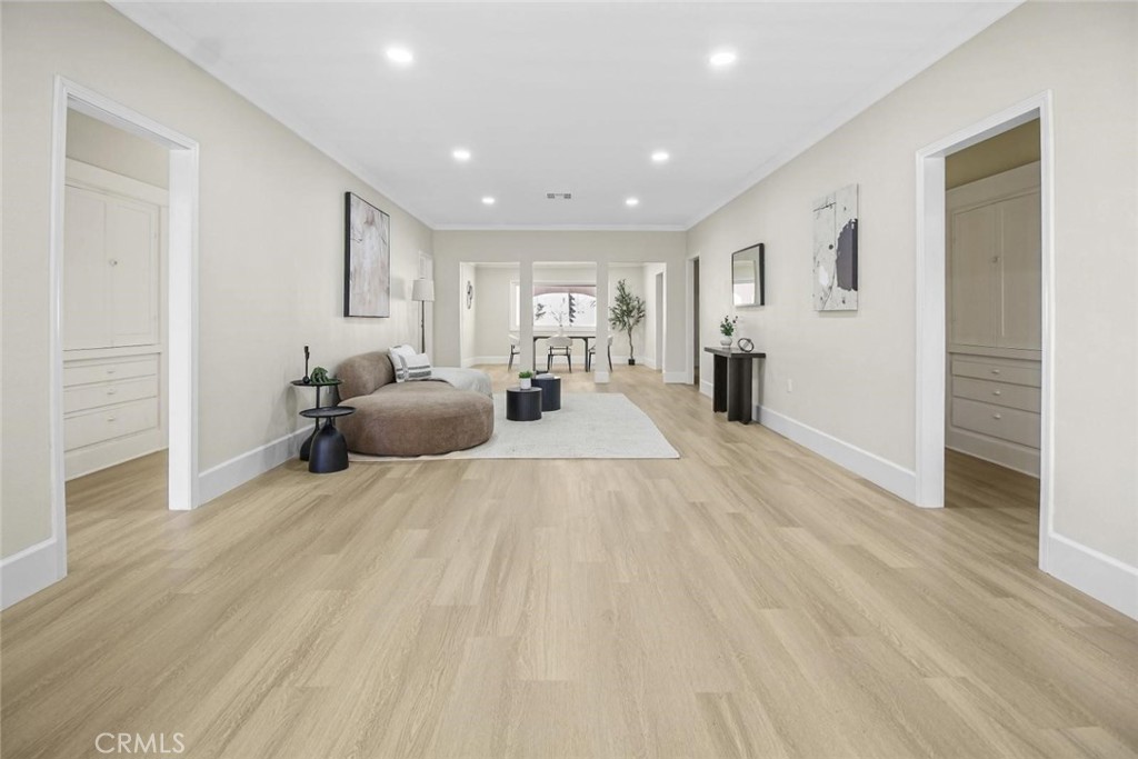 986 West Marshall Boulevard San Bernardino, CA 92405 - Photo 17 of 31 a living room with furniture and a wooden floor