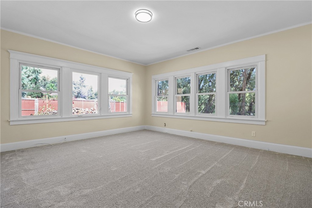 986 West Marshall Boulevard San Bernardino, CA 92405 - Photo 21 of 31 an empty room with windows