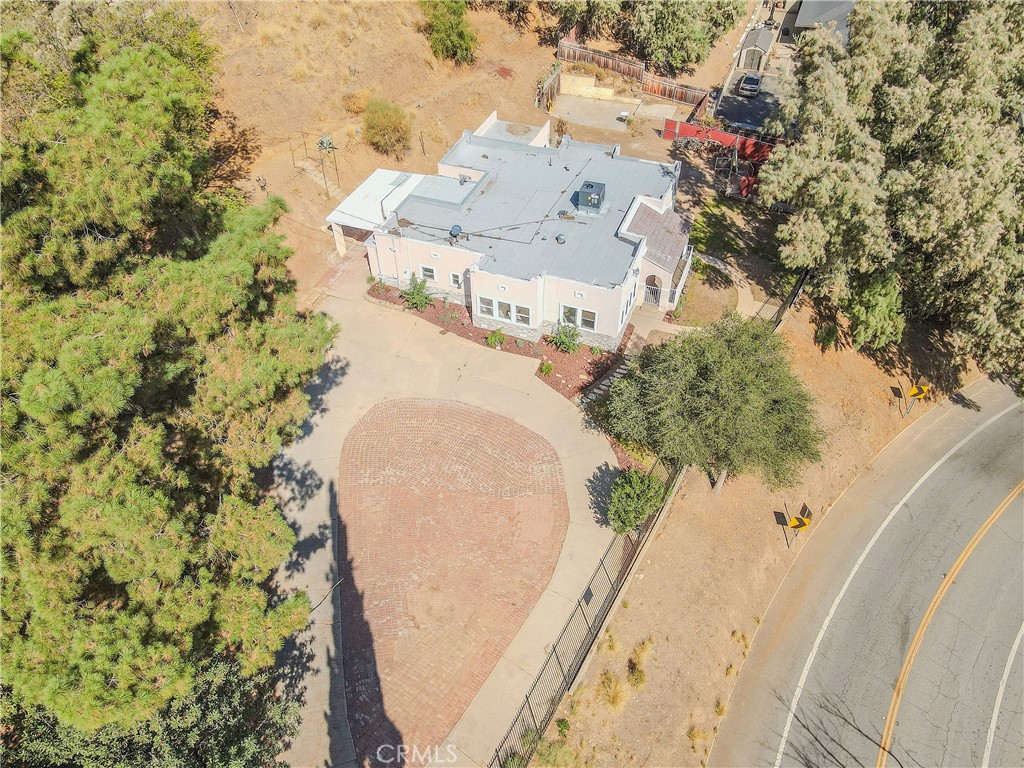 986 West Marshall Boulevard San Bernardino, CA 92405 - Photo 23 of 31 a view of a swimming pool with a yard