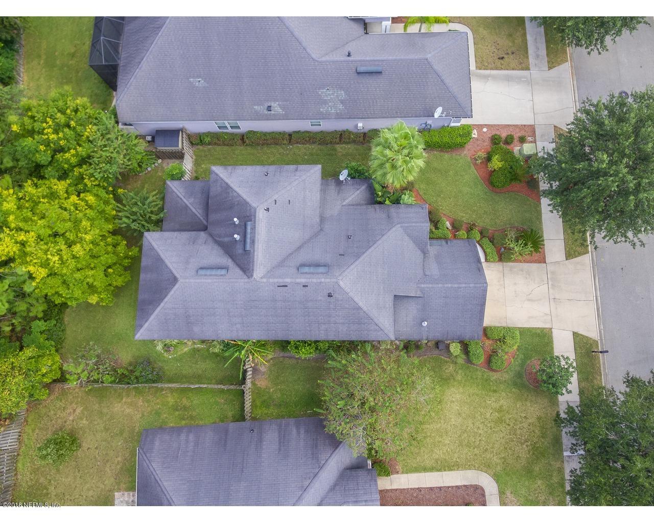 14350 Millhopper Road Jacksonville, FL 32258 - Photo 35 of 38 Bird's eye view of roof and driveway