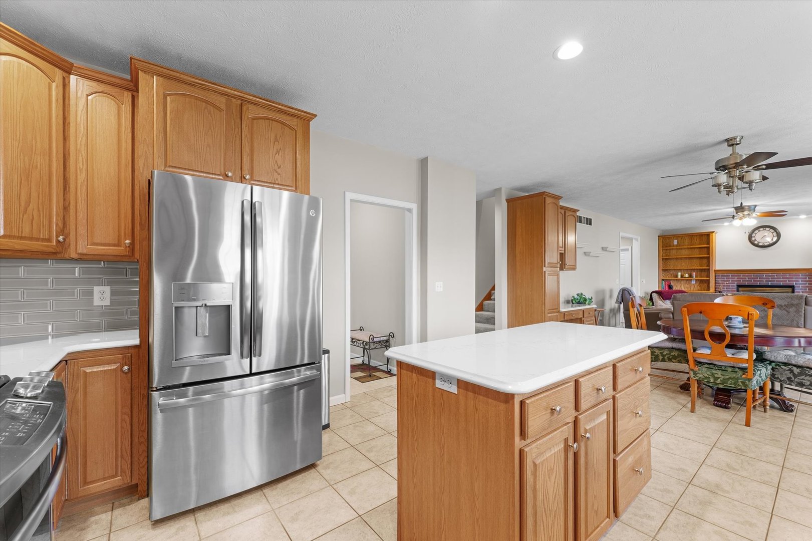 3908 Turnberry Drive Champaign, IL 61822 - Photo 12 of 49 a kitchen with stainless steel appliances a refrigerator and a stove top oven