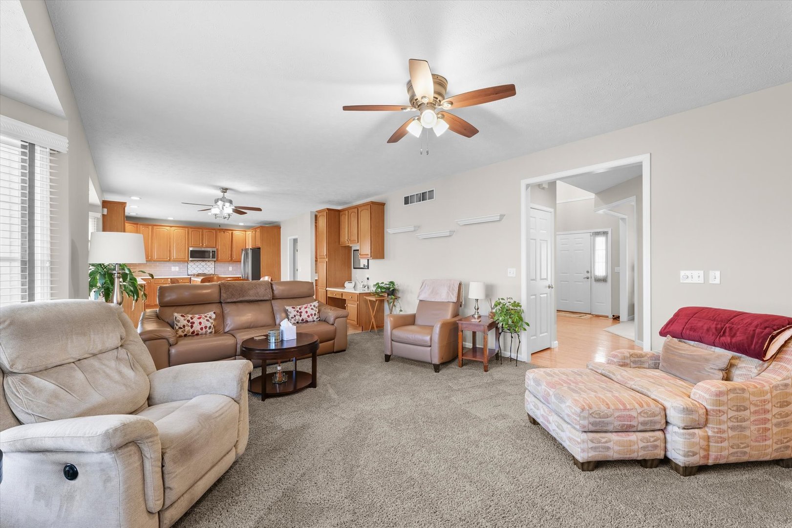 3908 Turnberry Drive Champaign, IL 61822 - Photo 19 of 49 a living room with furniture and a large window