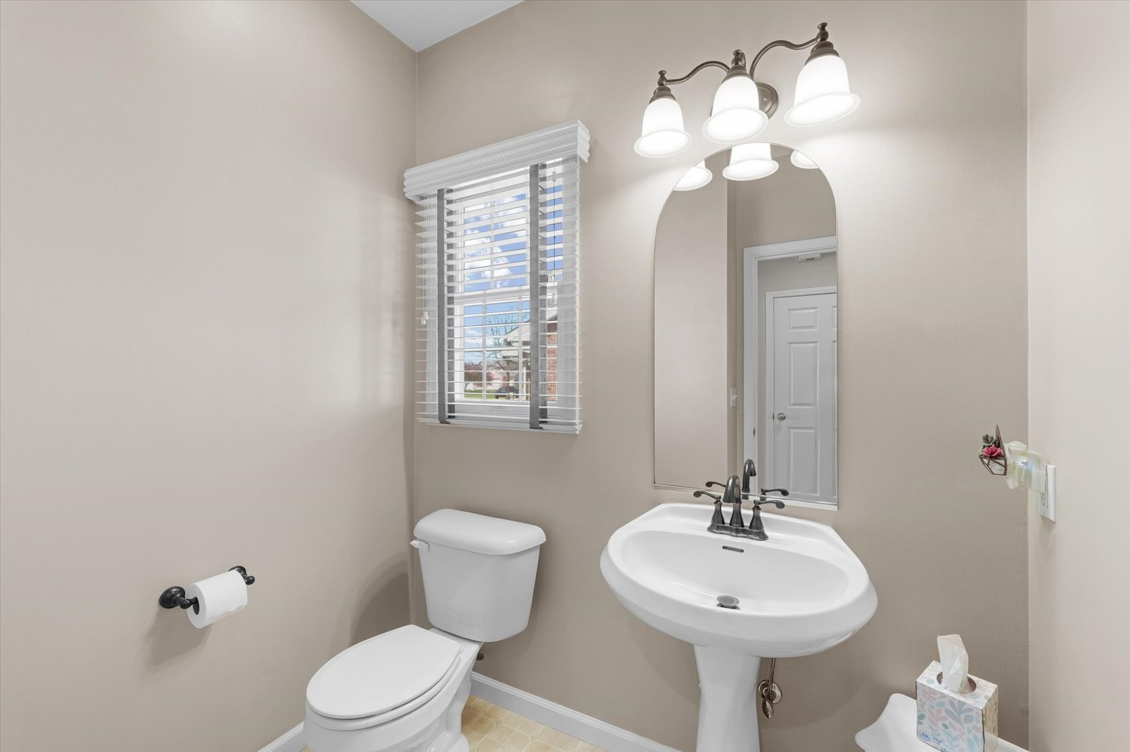 3908 Turnberry Drive Champaign, IL 61822 - Photo 20 of 49 a bathroom with a toilet sink and mirror