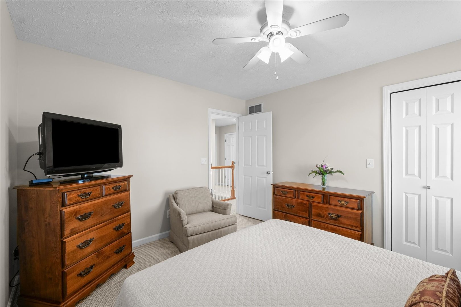 3908 Turnberry Drive Champaign, IL 61822 - Photo 31 of 49 a living room with furniture and a flat screen tv