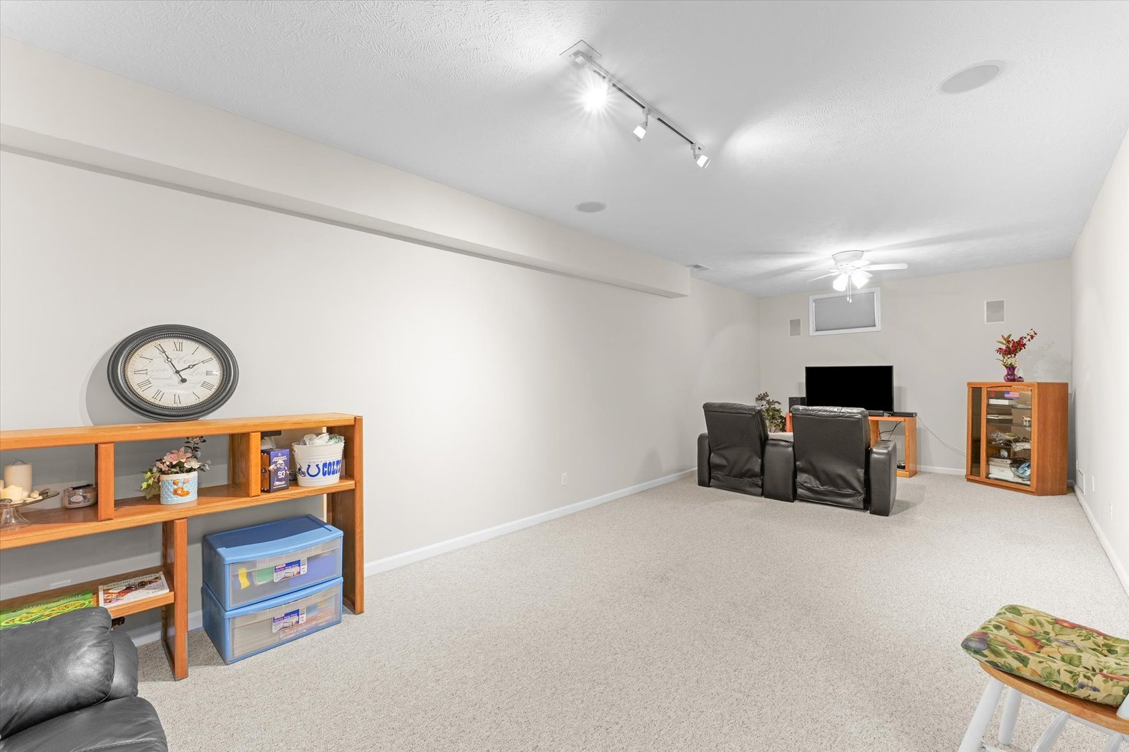 3908 Turnberry Drive Champaign, IL 61822 - Photo 37 of 49 a living room with furniture and a flat screen tv