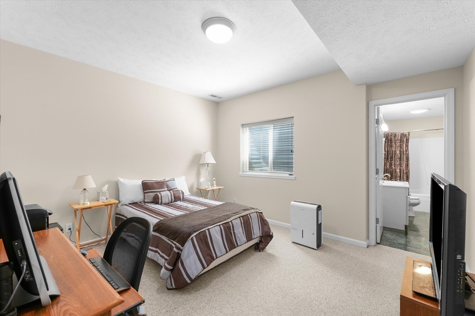 3908 Turnberry Drive Champaign, IL 61822 - Photo 40 of 49 a bedroom with a bed chair and a window