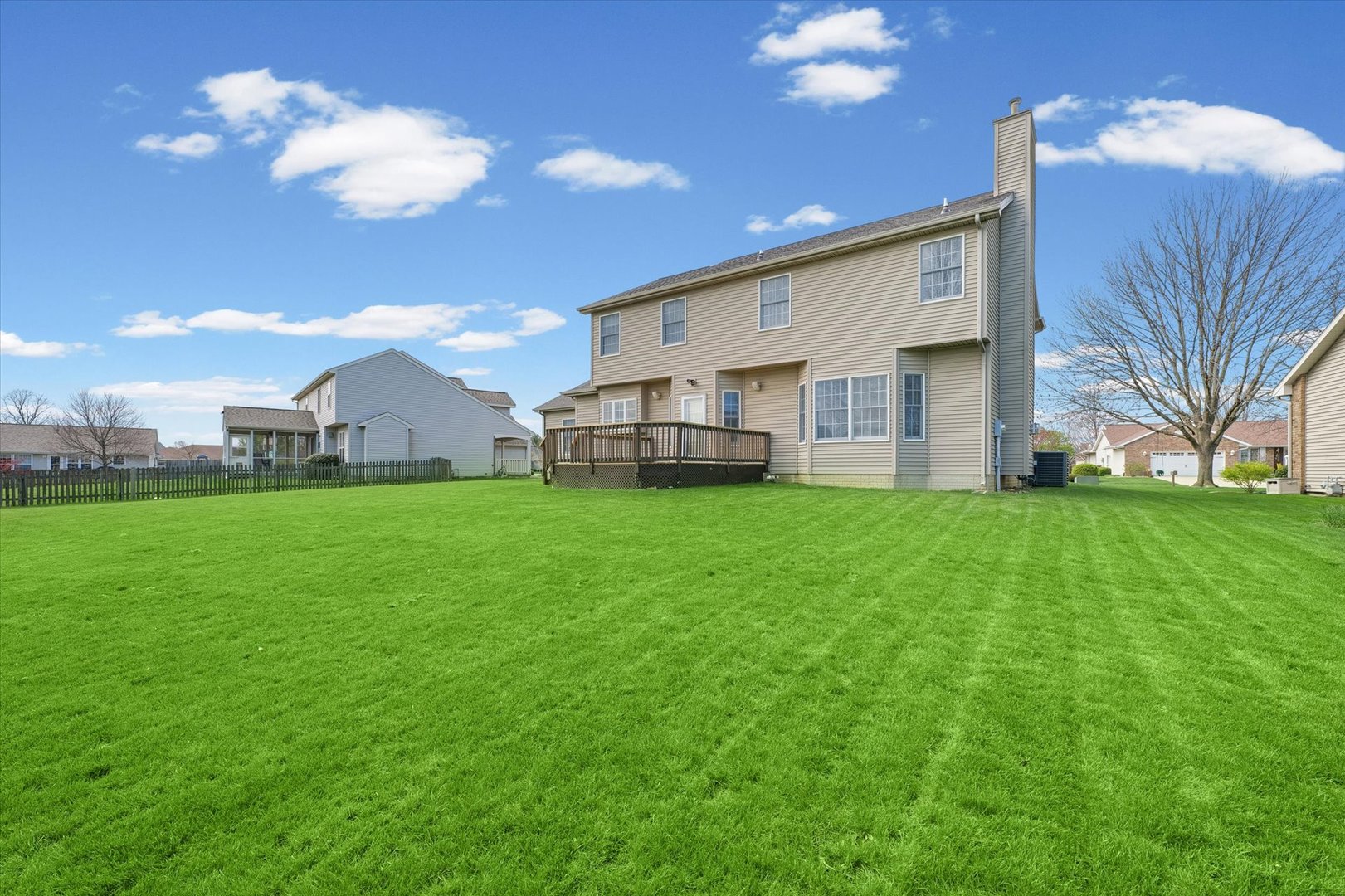 3908 Turnberry Drive Champaign, IL 61822 - Photo 46 of 49 a view of a house with a back yard