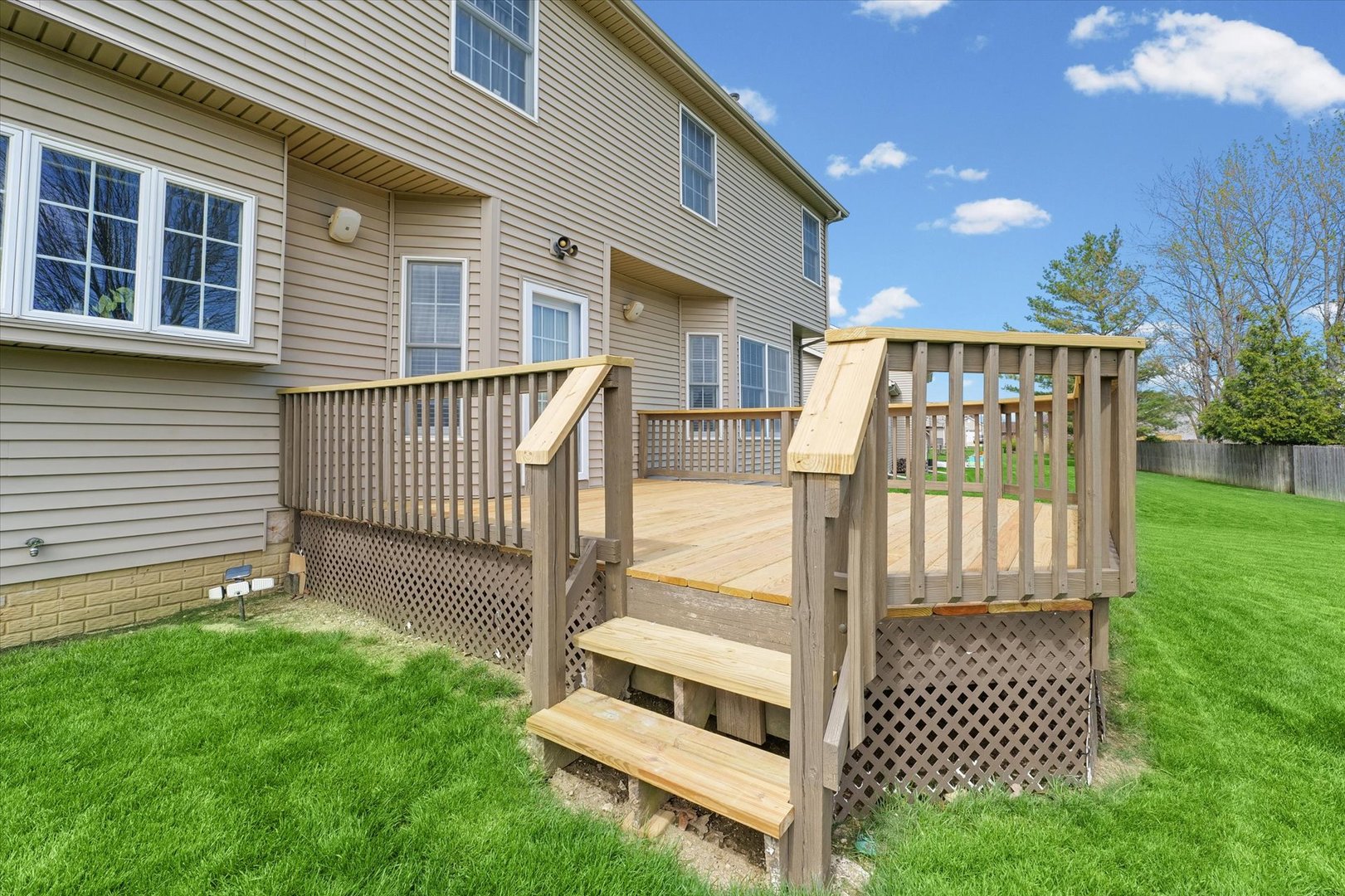 3908 Turnberry Drive Champaign, IL 61822 - Photo 47 of 49 a view of backyard with deck