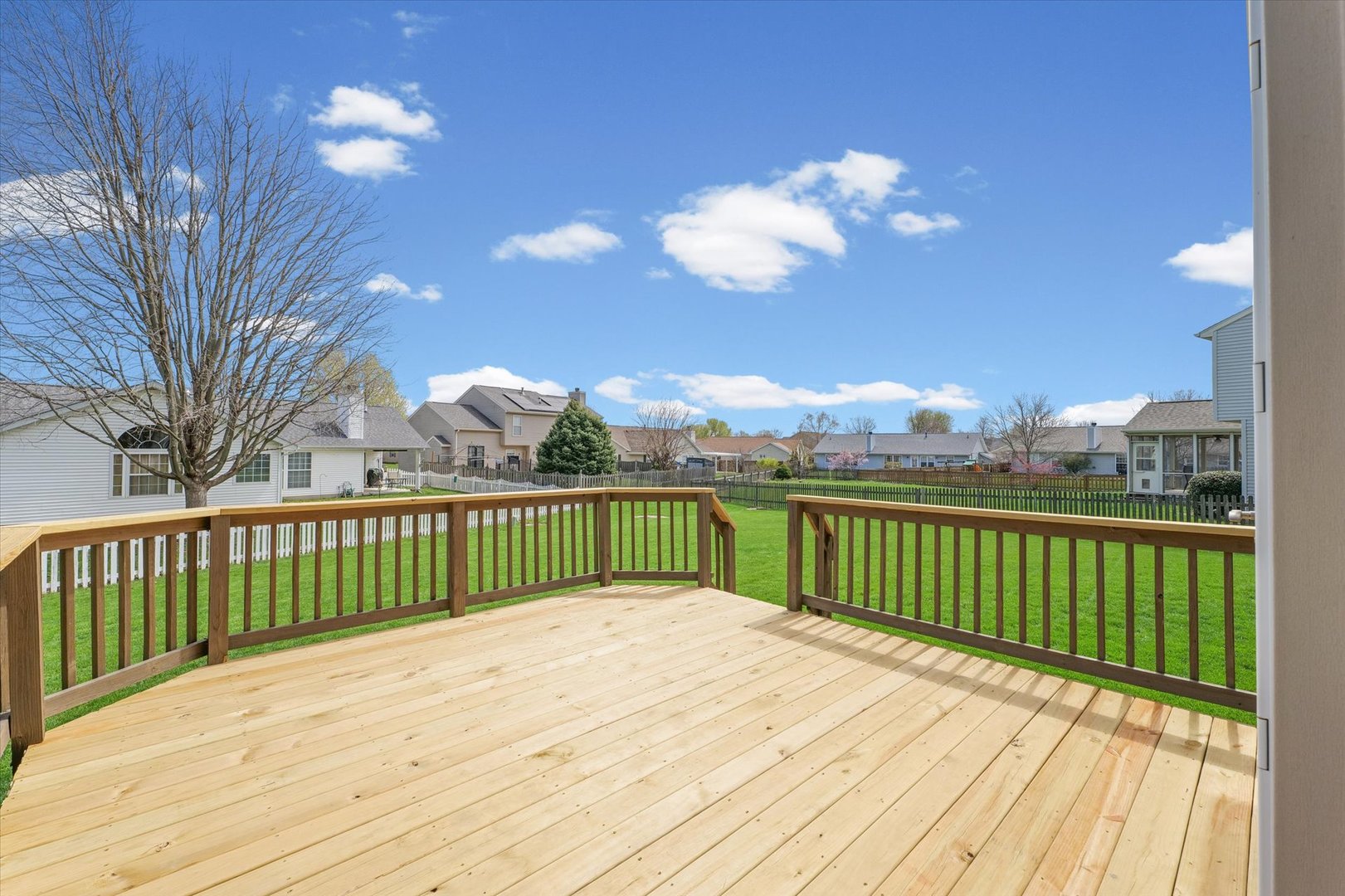 3908 Turnberry Drive Champaign, IL 61822 - Photo 48 of 49 a view of a balcony with wooden floor