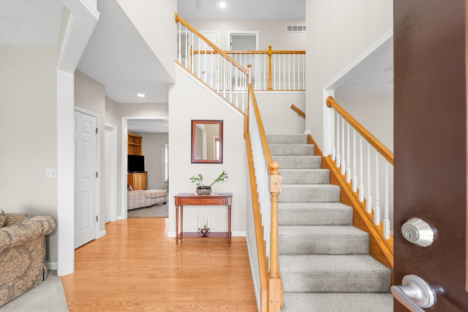 3908 Turnberry Drive Champaign, IL 61822 - Photo 6 of 49 a view of entryway and hall with wooden floor