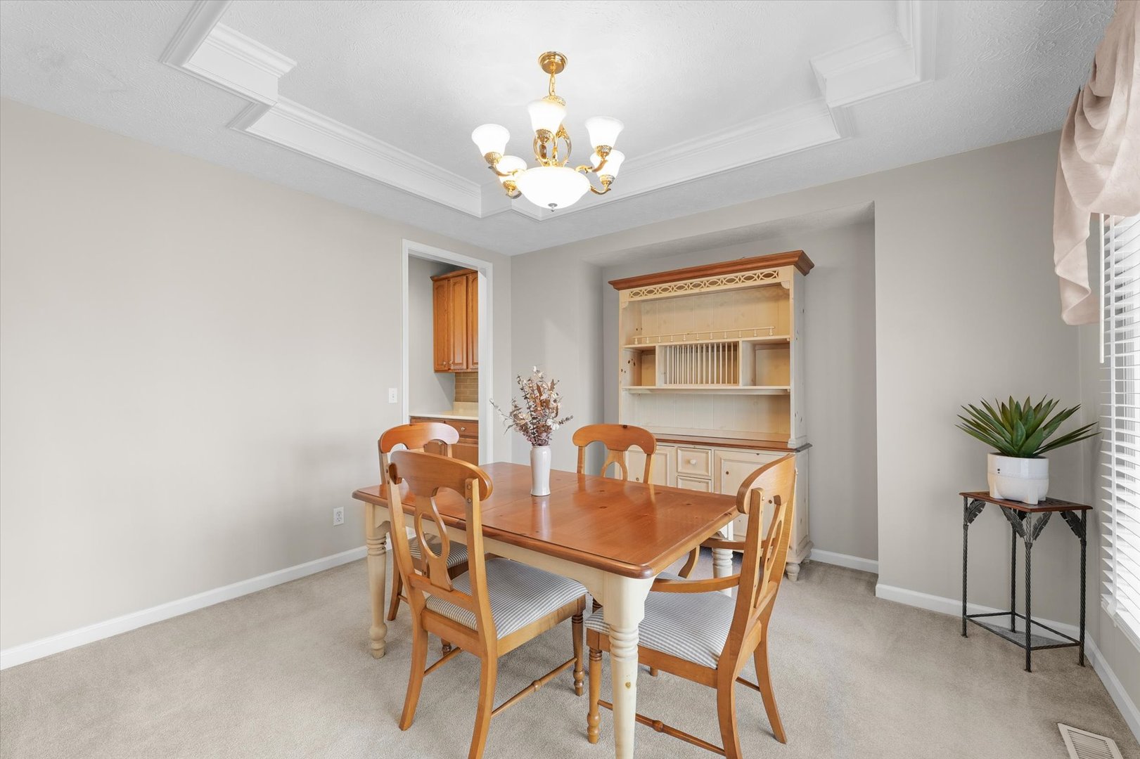 3908 Turnberry Drive Champaign, IL 61822 - Photo 8 of 49 a dining room with furniture and chandelier