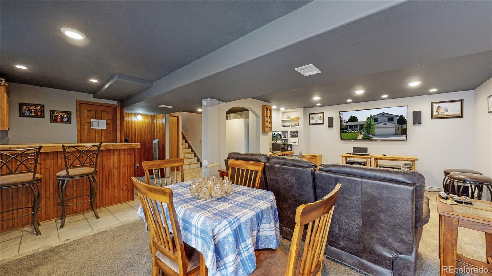 1296 Northridge Road Highlands Ranch, CO 80126 - Photo 21 of 28 a view of a dining room with furniture