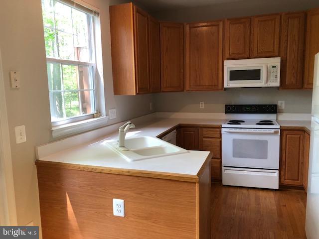 1234 Wild Hawthorn Way Reston, VA 20194 - Photo 21 of 42 Tons of Cabinets enhance the kitchen