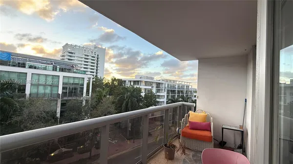 a view of roof deck with seating space