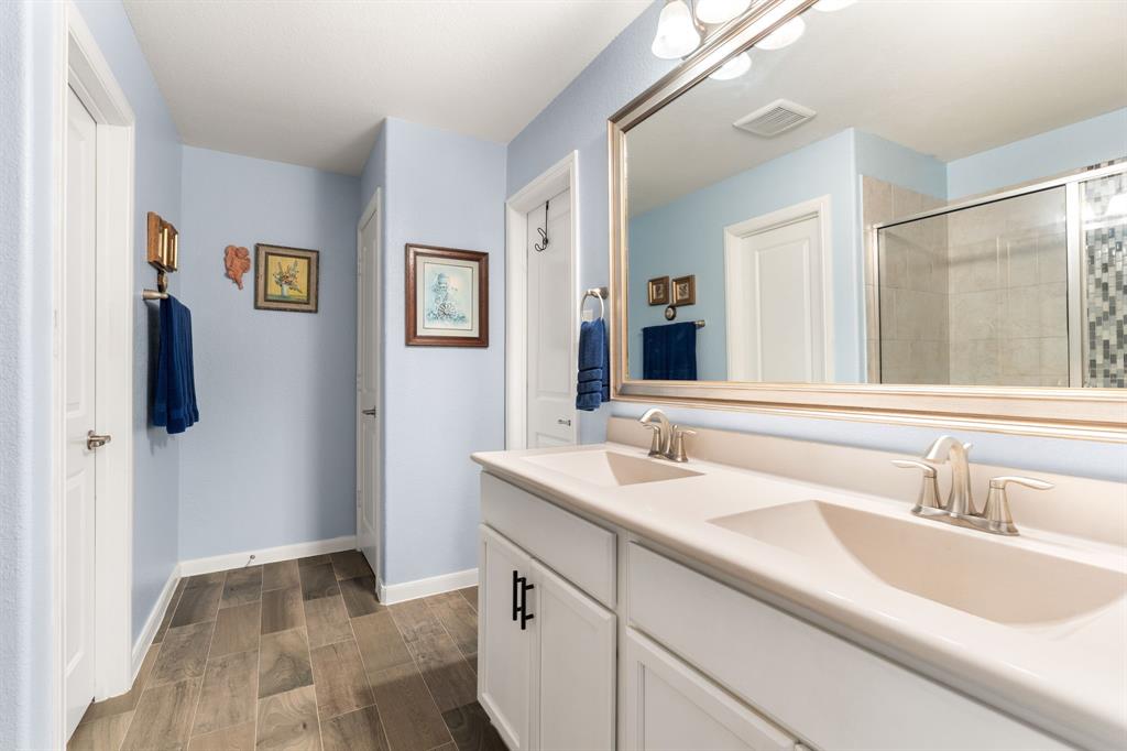 300 Copper Switch Drive Anna, TX 75409 - Photo 15 of 26 Primary with double sinks, walk in large closet and private water closet and linen closet