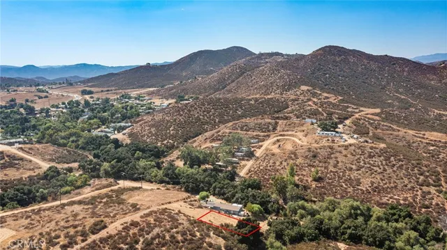an aerial view of residential building and parking space