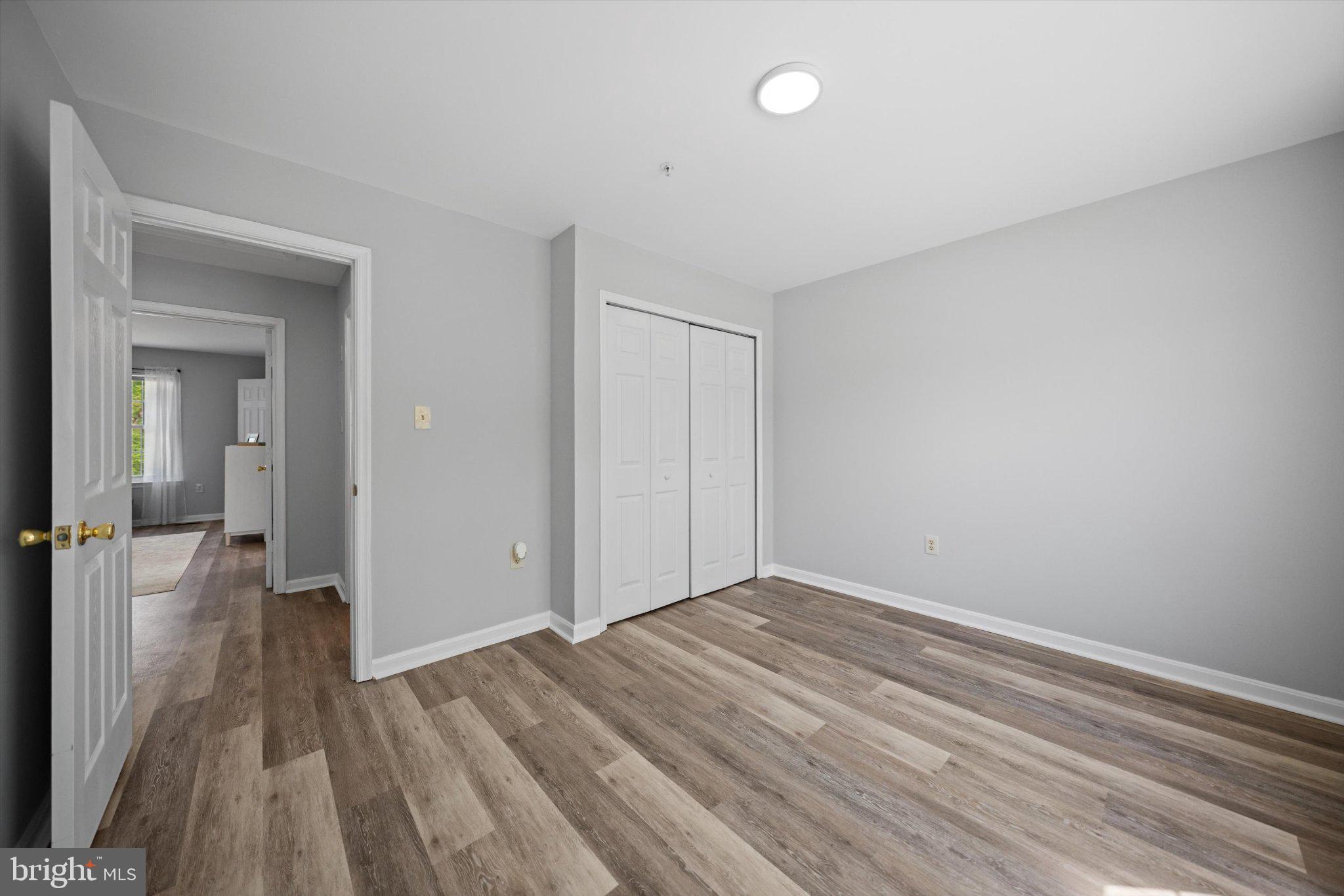 12908 Windbrook Drive Clinton, MD 20735 - Photo 27 of 67 wooden floor in an empty room