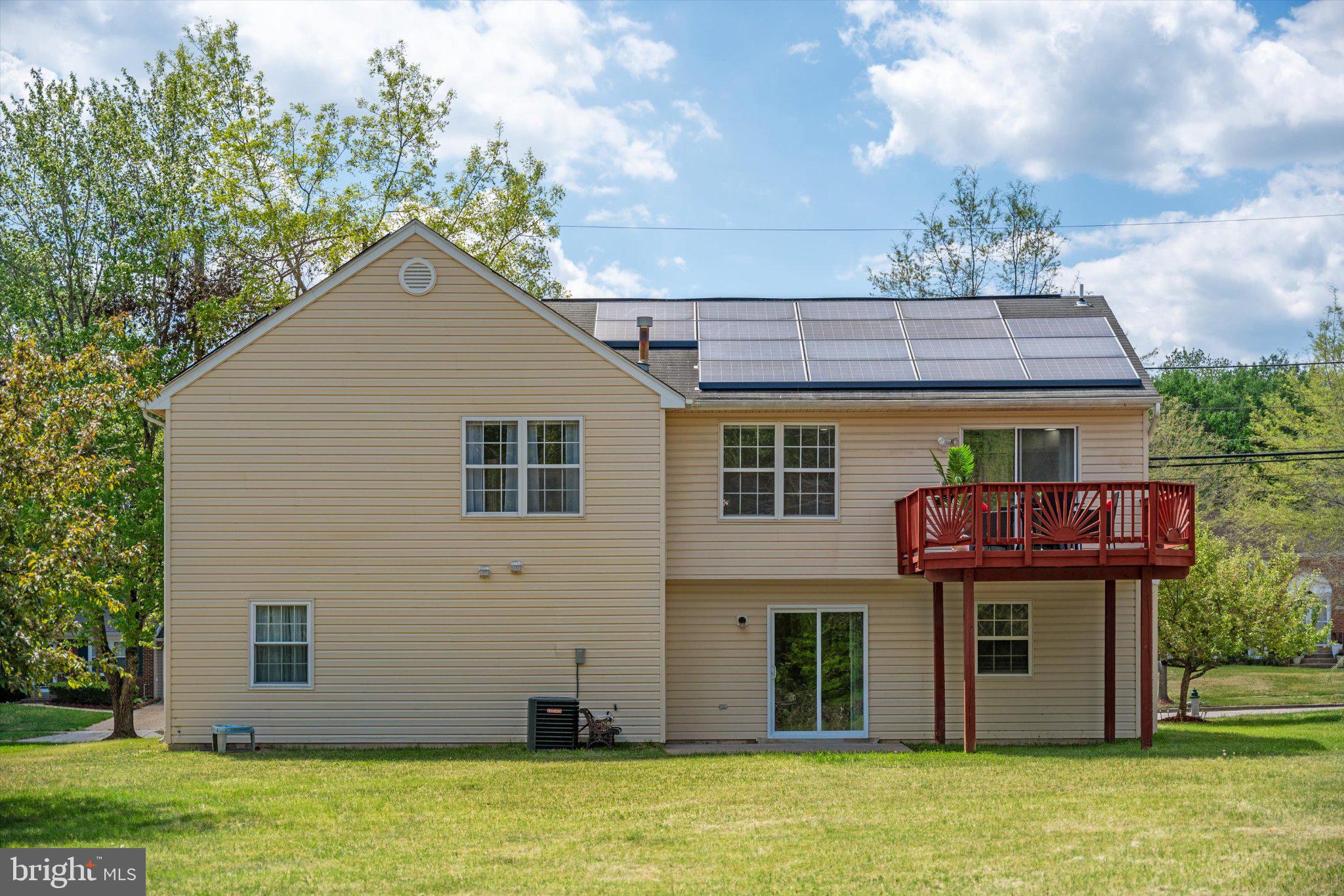 12908 Windbrook Drive Clinton, MD 20735 - Photo 32 of 67 a front view of a house with a garden