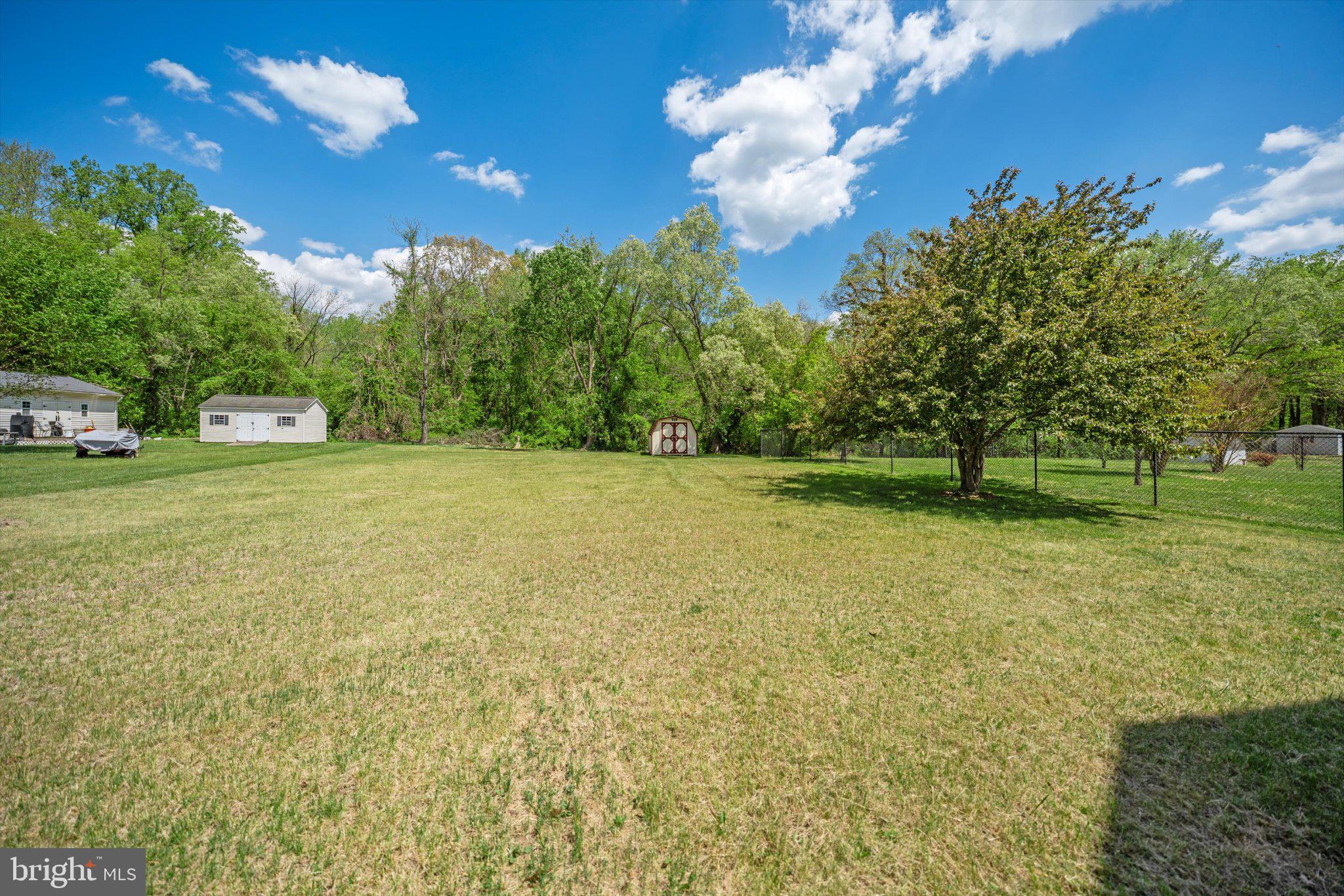 12908 Windbrook Drive Clinton, MD 20735 - Photo 36 of 67 Spacious green oasis under blue skies.