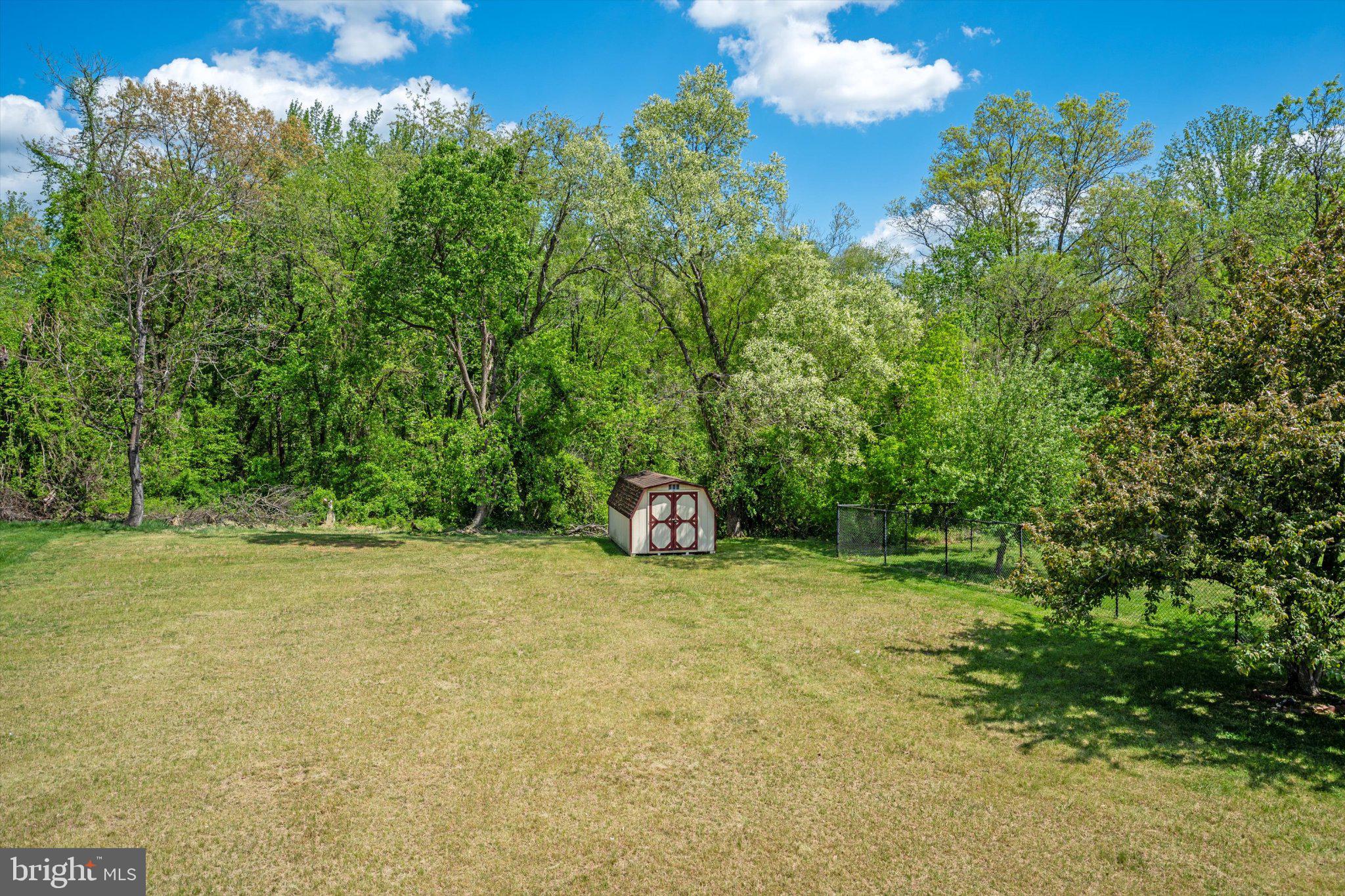 12908 Windbrook Drive Clinton, MD 20735 - Photo 37 of 67 a view of a field with an outdoor space