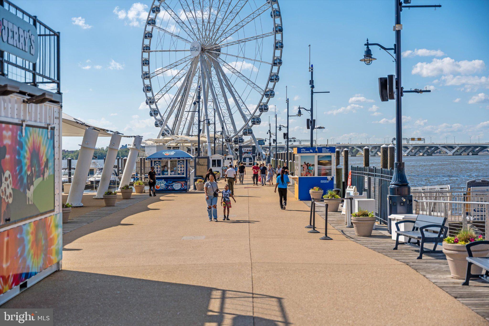 12908 Windbrook Drive Clinton, MD 20735 - Photo 49 of 67 Strolling by the riverside Ferris wheel.
