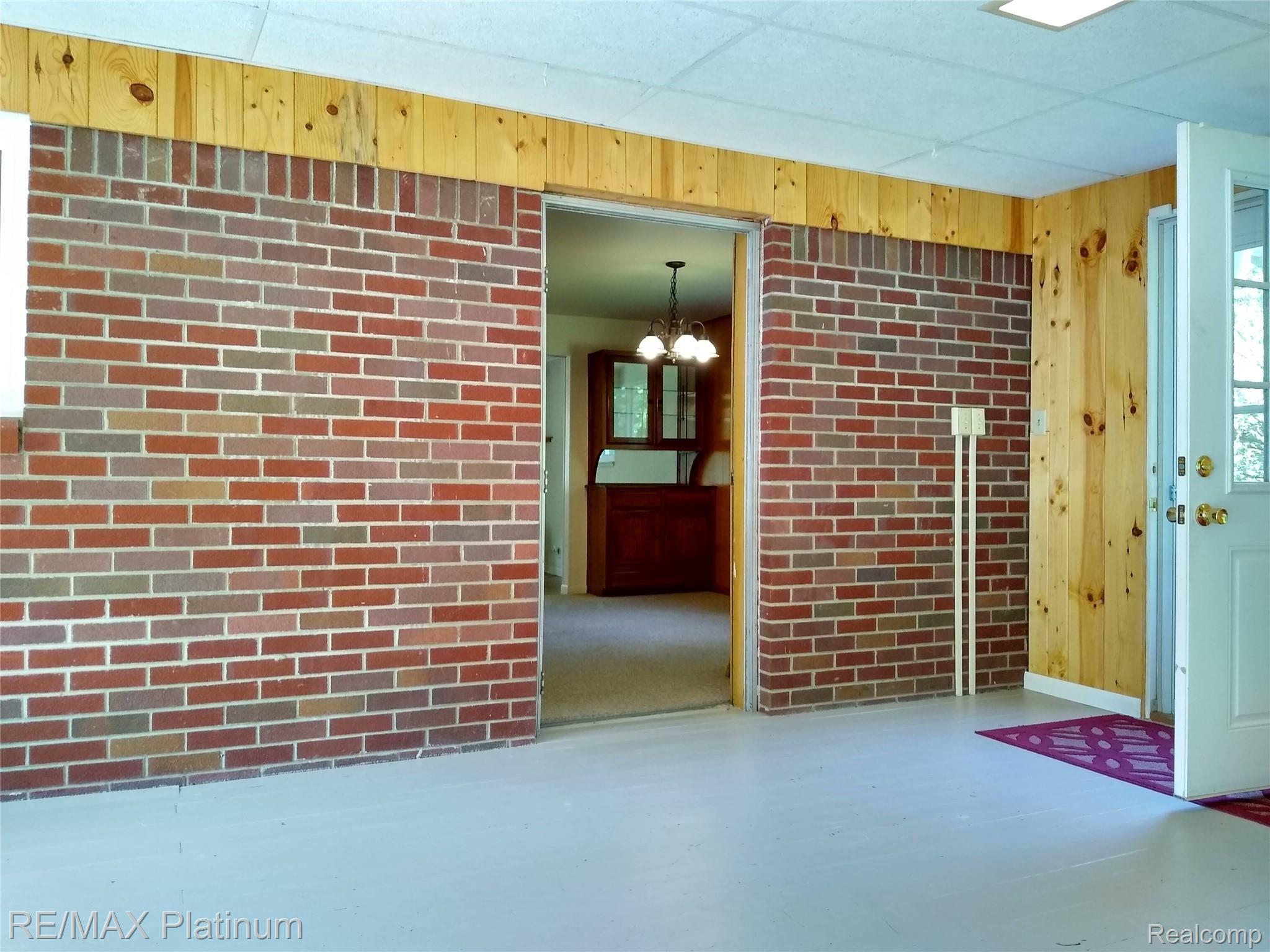1555 Chilson Road Howell, MI 48843 - Photo 18 of 47 Doors to the outside and into dining room