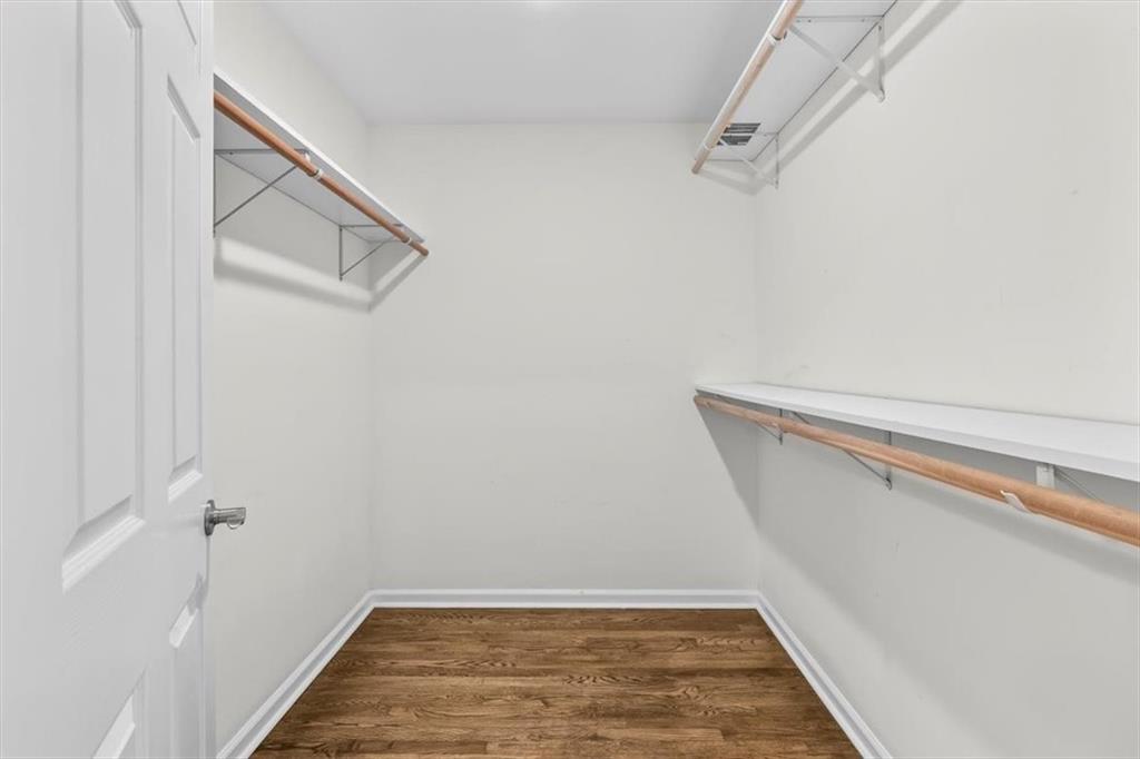 227 Rolling Wood Circle Northwest Rome, GA 30165 - Photo 16 of 31 a view of a room with racks on the wall