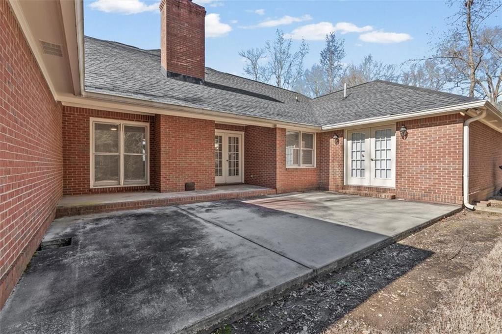 227 Rolling Wood Circle Northwest Rome, GA 30165 - Photo 27 of 31 a front view of a house with a yard