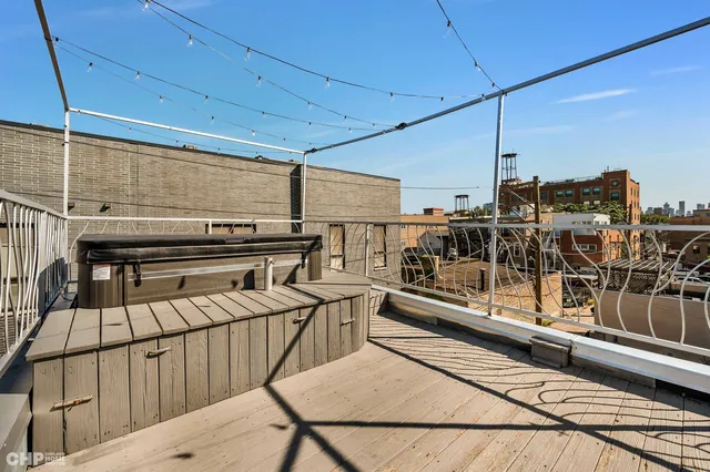 a view of a balcony with chairs