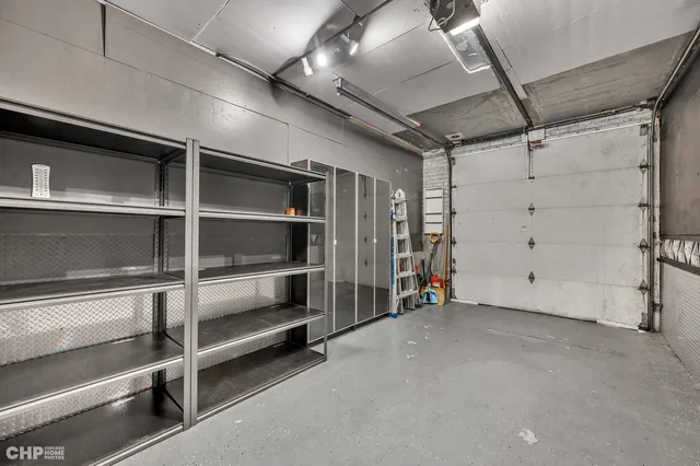 a view of an empty room with white walls