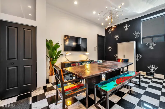 a room with furniture and kitchen view