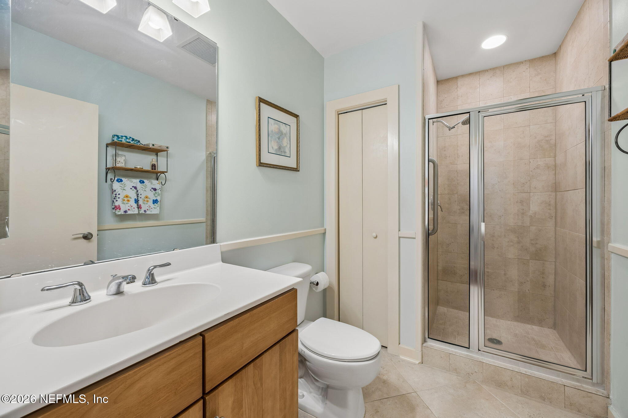 1661 Riverside Avenue, Unit 410 Jacksonville, FL 32204 - Photo 18 of 54 a bathroom with a sink toilet and shower