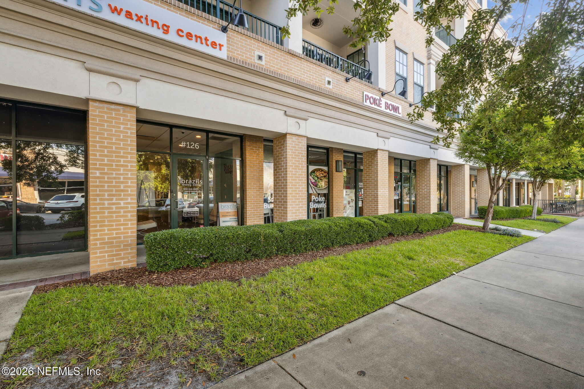 1661 Riverside Avenue, Unit 410 Jacksonville, FL 32204 - Photo 38 of 54 a view of a house with a yard