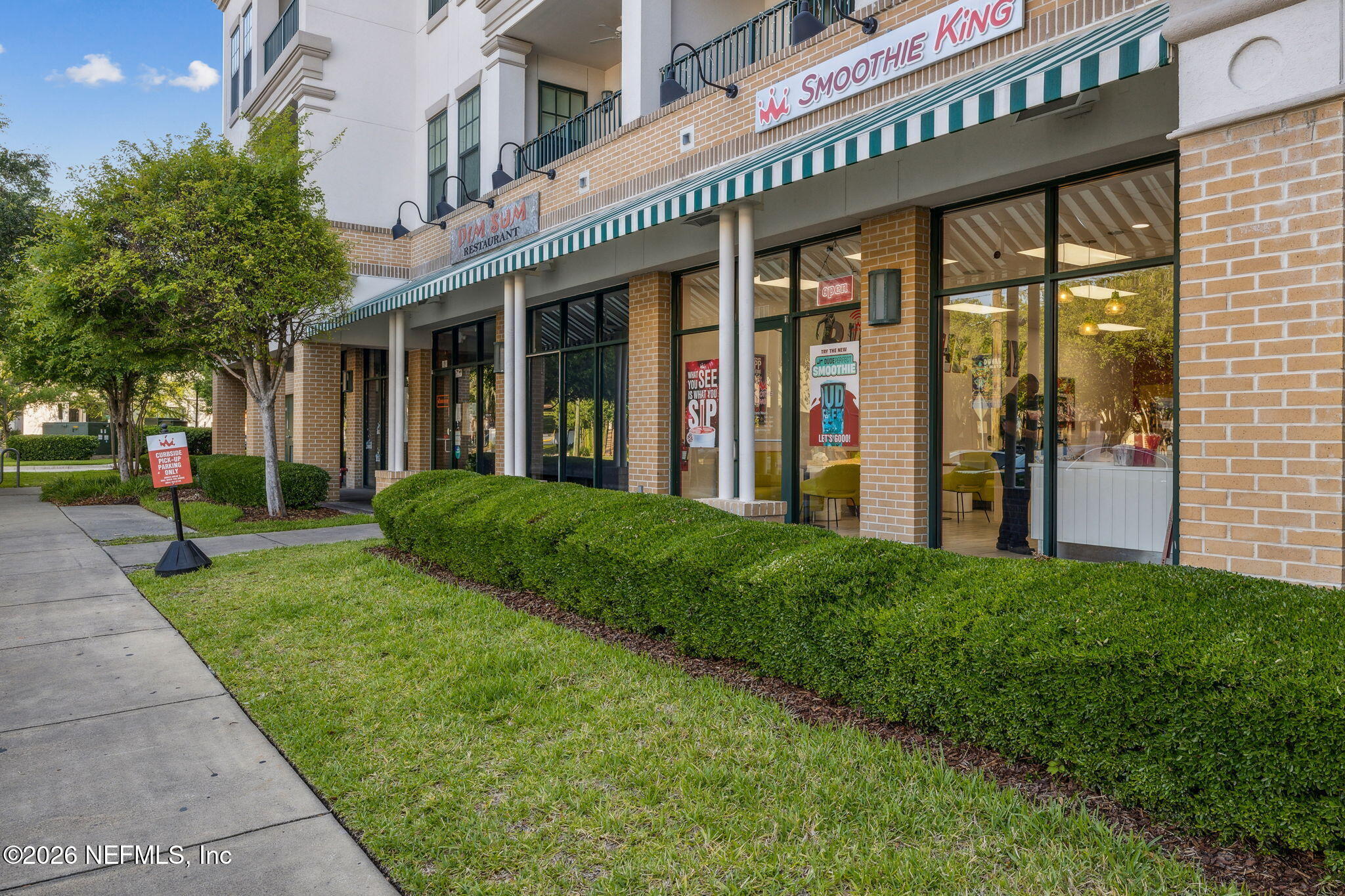 1661 Riverside Avenue, Unit 410 Jacksonville, FL 32204 - Photo 39 of 54 a view of a building with a garden