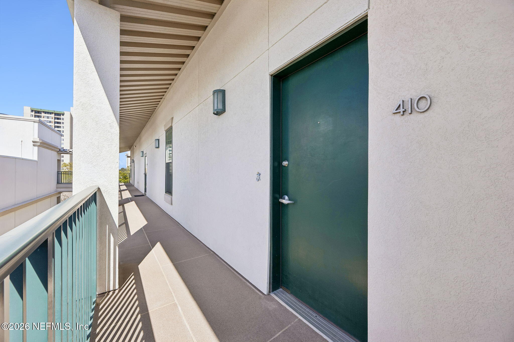 1661 Riverside Avenue, Unit 410 Jacksonville, FL 32204 - Photo 5 of 54 a view of entryway and hall with wooden floor