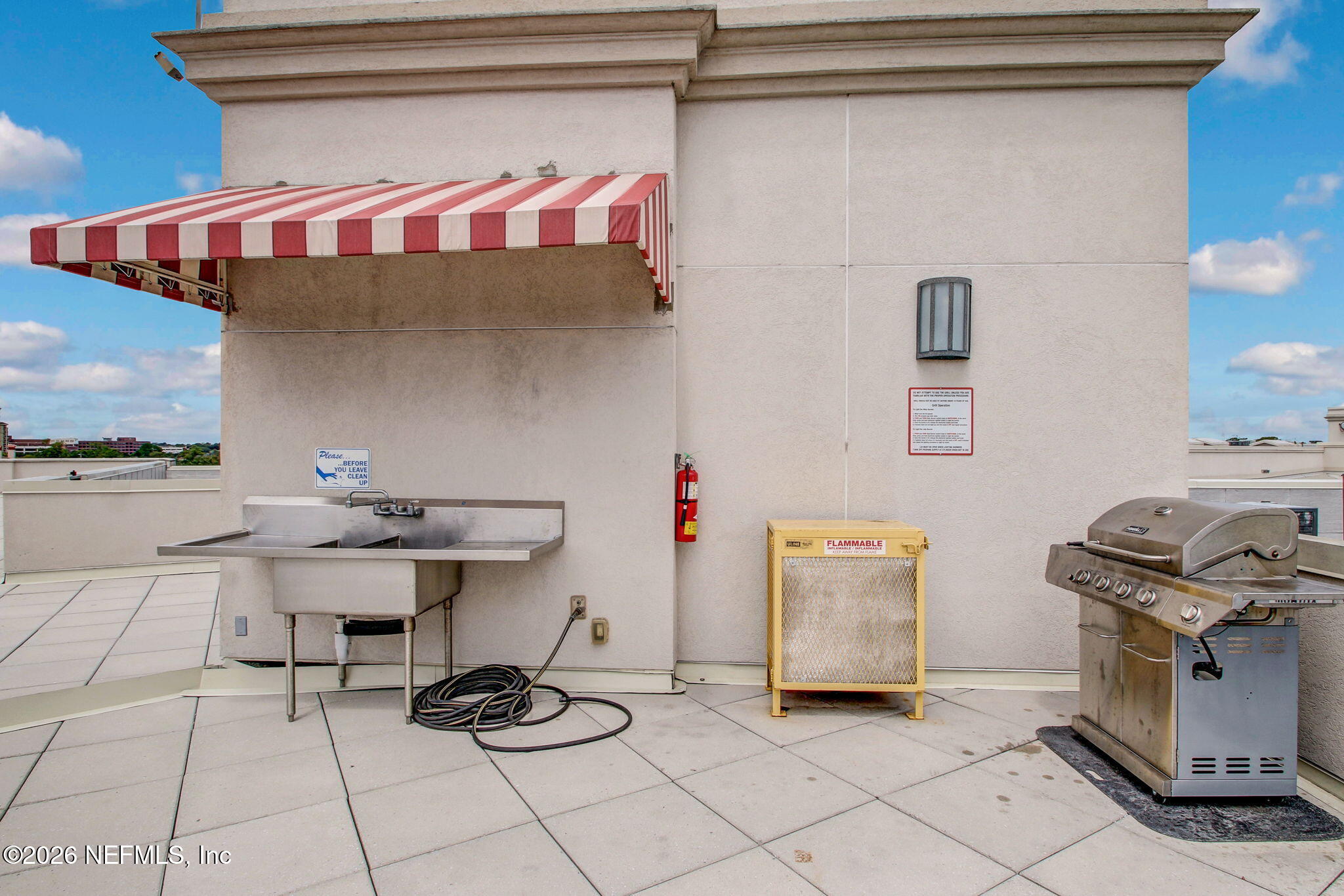 1661 Riverside Avenue, Unit 410 Jacksonville, FL 32204 - Photo 51 of 54 a view of kitchen with stainless steel appliances cabinets and stove top oven