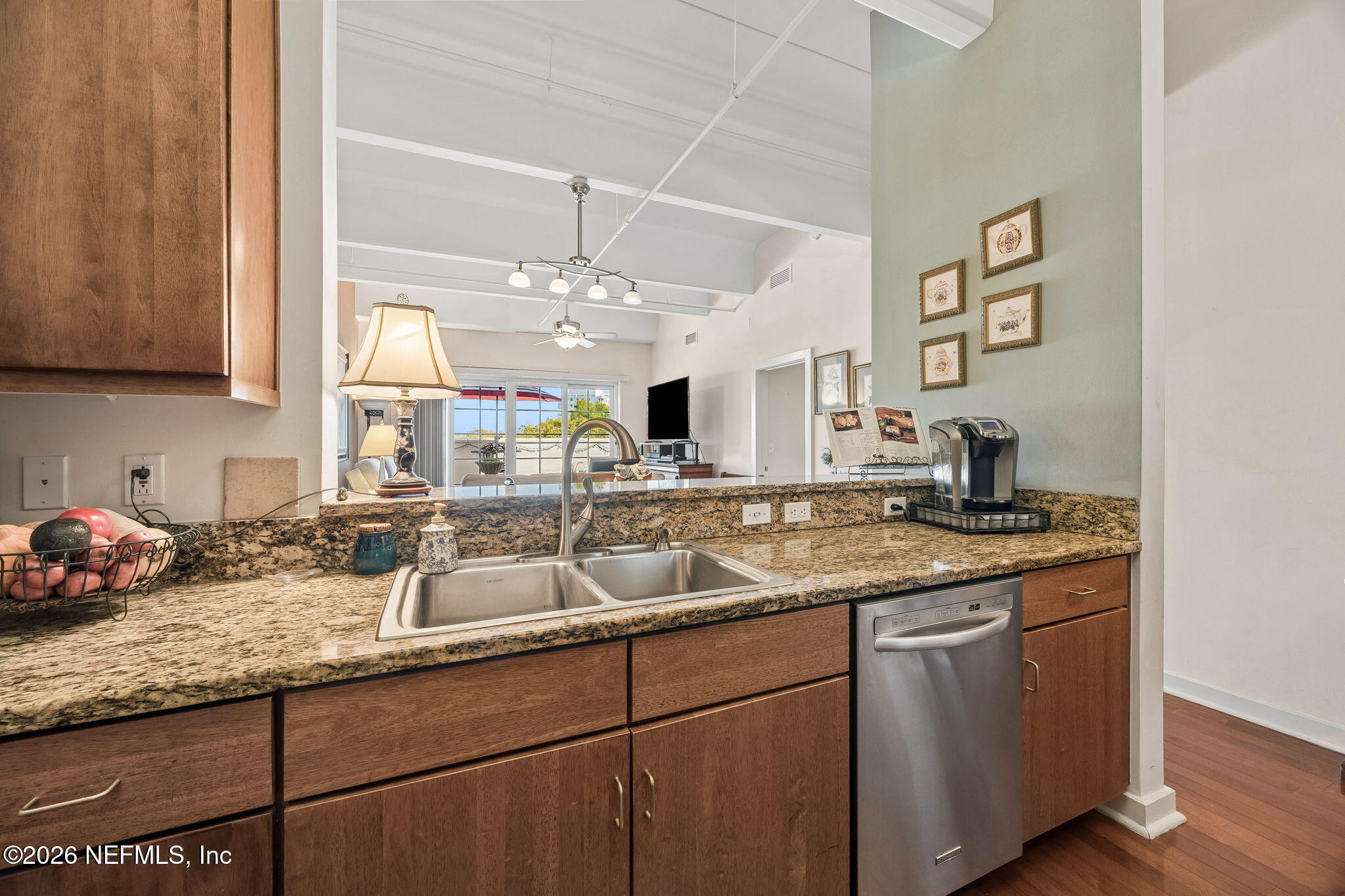 1661 Riverside Avenue, Unit 410 Jacksonville, FL 32204 - Photo 9 of 54 a kitchen with a sink and a cabinets