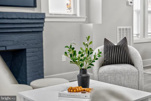 a vase of flowers sitting on a table