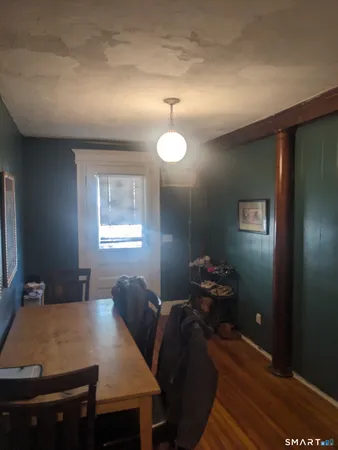 a workspace with furniture and window
