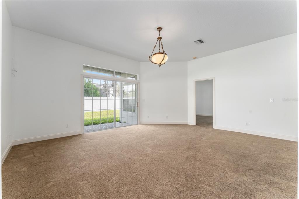 3003 Southwest 41st Place Ocala, FL 34474 - Photo 25 of 51 a view of an empty room with a window