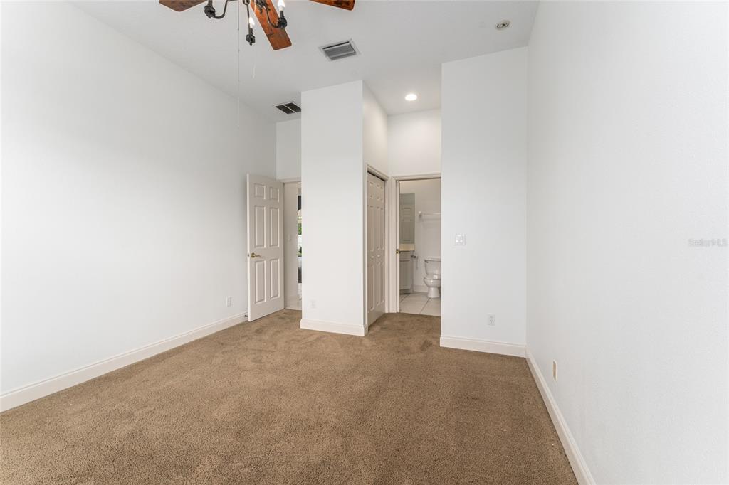 3003 Southwest 41st Place Ocala, FL 34474 - Photo 30 of 51 an empty room with fan and entryway