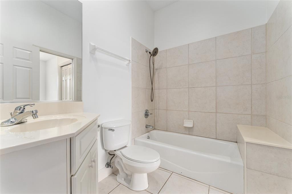 3003 Southwest 41st Place Ocala, FL 34474 - Photo 33 of 51 a bathroom with a sink a toilet and bathtub