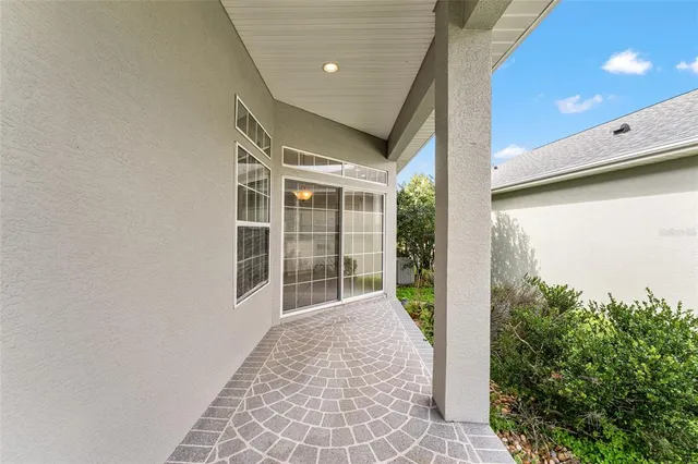 a view of a back yard from a balcony