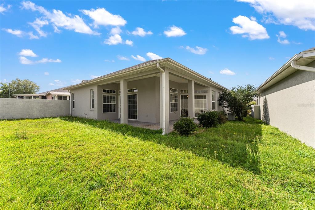 3003 Southwest 41st Place Ocala, FL 34474 - Photo 44 of 51 a view of a house with patio