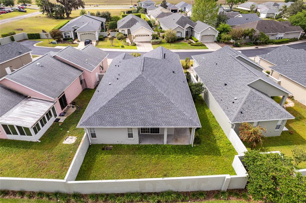 3003 Southwest 41st Place Ocala, FL 34474 - Photo 45 of 51 an aerial view of residential houses with yard