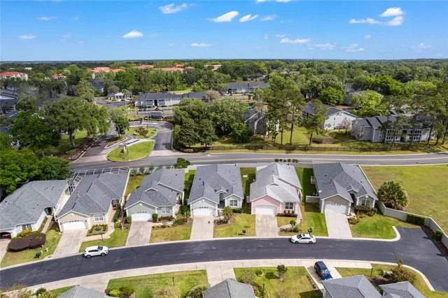 a view of a swimming pool with an outdoor seating
